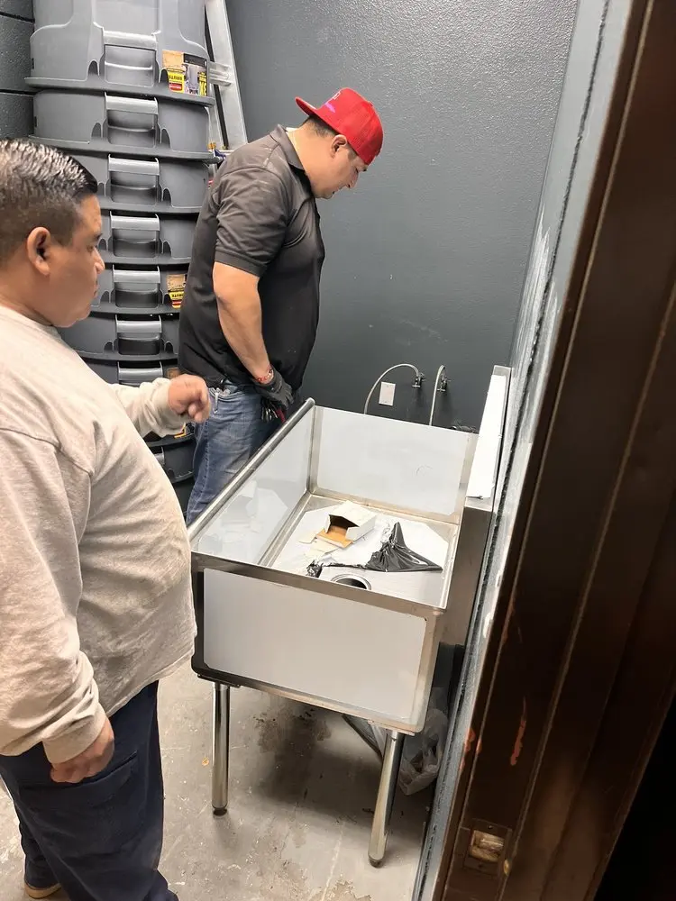 Commercial plumbing and sink installation in Poneto